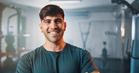 Portrait, exercise and happy man in club for fitness, muscle and strength for health. Smile,...