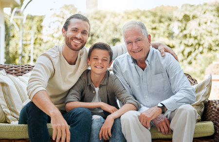 Family, men or child in portrait for generations, love or visit to retirement home with smile. Grandpa, dad or son on patio sofa for weekend relax, joking or happy for storytelling with laugh or funの写真素材