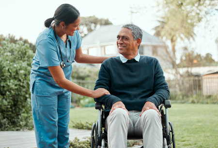Nurse, garden and senior man in wheelchair with a disability in retirement community park for fresh air. Female caregiver, elderly person and outdoor together with support for assisted living or careの写真素材
