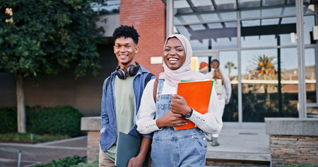Islamic, portrait or friends with smile in college for learning, degree or studying in university campus. Diversity, open or happy students with book or confidence for school scholarship or educationの写真素材