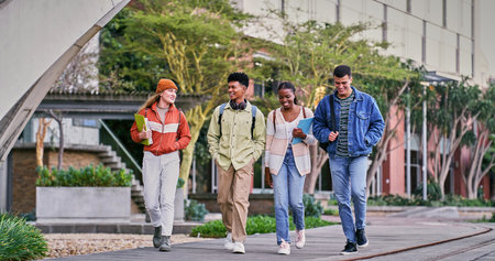 Group, students and walking with friends, smile and backpacks for outdoor on campus or university. People, happy and talking for education, development and scholarship for learning, college or schoolの写真素材