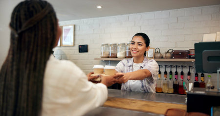 Cafe, customer and woman with coffee, serving and smile for purchase in store, giving and...