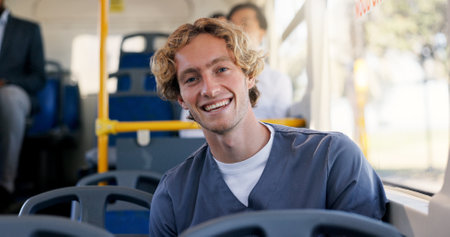 Commute, nurse and portrait with man on bus for journey or travel to healthcare job. Internship, Scrubs and smile with happy medical professional in vehicle for public transportation to workの写真素材