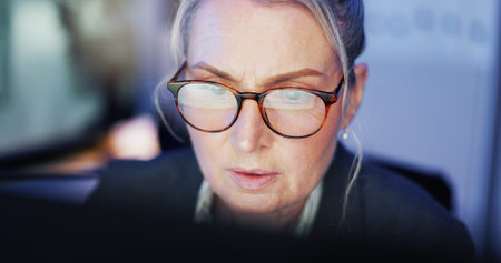 Business, glasses and woman in office, reflection and serious with coding, software update and...