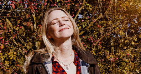 Fall, nature and portrait of woman with peace, freedom and happiness outdoor in garden or backyard....