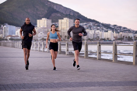 Fitness, friends and group on promenade for training, wellness and endurance exercise. Athlete, men...