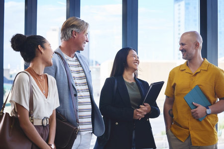 Business people, discussion and laughing in office for teamwork, meeting and workforce. Men, women...