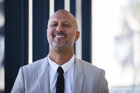 Happy, portrait and mature businessman in office with positive, confident and proud attitude. Smile,...