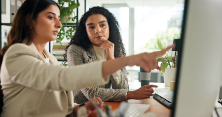 Meeting, creative and business women on computer for planning, online project and copywriting. Publishing agency, professional writers and people on pc for research, feedback and website articleの写真素材