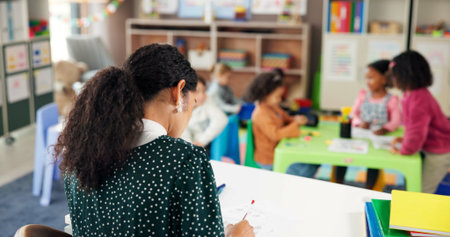 Grading, woman and teacher in classroom, education and review of test, growth and development of...