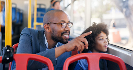 Window, man and child in bus, pointing and smile for view in public transport, bonding and...
