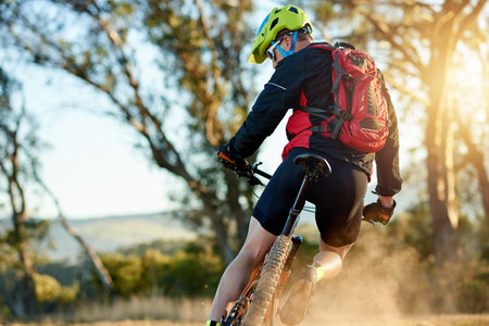 Man, cycling or dirt road with bicycle for extreme sport, fitness or cardio workout in nature....