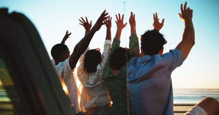 People, hands and friends at beach for freedom with road trip, excited and support outdoor. Sunset, students and happy to celebrate, travel or vacation from back with connection on nature adventureの写真素材