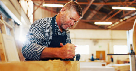 Carpentry, industry and plane with man in workshop for manufacturing or production process....