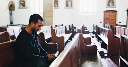 Church, man and prayer for religion with rosary for faith, respect or worship God for forgiveness....
