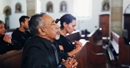 Religion, praying and man in church with family for christian service with congregation. Worship,...