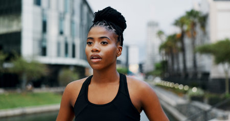Training, tired and black woman in city, breathing and wellness with exercise, rest and fitness....