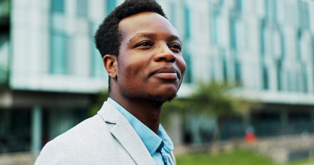 Smile, thinking and business with black man in city for property developer, confidence and...