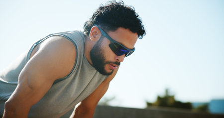 Fitness, fatigue and man on break in city, exhausted and relax for exercise recovery. Workout, tired...