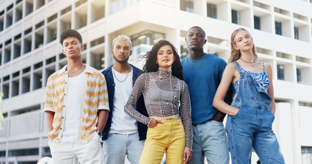 Fashion, portrait and student friends in city together for education, learning or scholarship. Attitude, college or university with happy men and women outdoor on campus for development or growthの写真素材