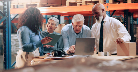 Distribution, people and conversation in warehouse, laptop or online schedule for shipping. Employees, quality control or meeting with inspection, export or tablet for email, cooperation or checklistの写真素材