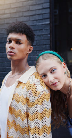 Fashion, portrait and student couple in city for education or scholarship together. Campus, college or university with serious man, woman and outdoor for development, future or growth with Gen zの写真素材