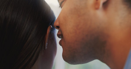 Closeup, ear or couple whisper with secret for confidential information, gossip news or listening to story. People, private communication and share announcement with discussion, talking or hear rumorの写真素材