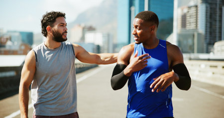 City, fitness and teamwork with men on bridge together for support, training or workout routine. Cardio, exercise and running with athlete friends outdoor on street of urban town for challengeの写真素材