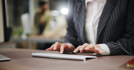 Hands, business and woman in office, keyboard and typing with website info, accounting and email feedback. Closeup, person and financial advisor in workplace, corporate report and review statisticsの写真素材