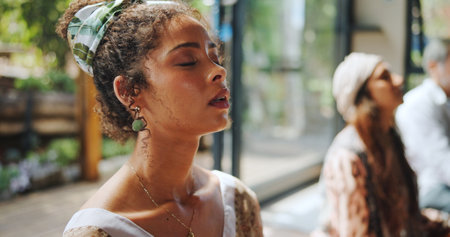 Relax, face and woman with breathing meditation for calm mindset, zen and inner peace in group. Air, exhale and person with eyes closed in class for mindfulness, mental wellness or holistic self careの写真素材