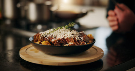Cooking, food and steak dish in kitchen for dinner recipe, meal presentation and gourmet cuisine....