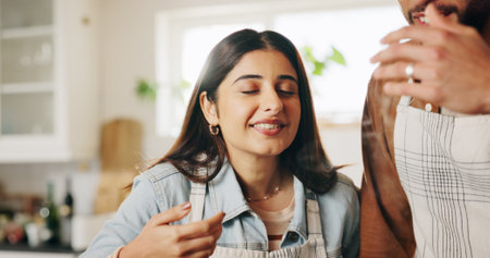 Couple, cooking and smell in home for lunch preparation, fresh aroma and creative meal process. Flavor scent, people and healthy food for gourmet cuisine, dinner nutrition or dish progress at houseの写真素材