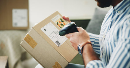 Hands, small business and man with package, scanner and machine for quality control. Closeup,...