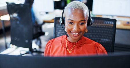 Business, woman and headset with computer at call centre for customer service, contact us and...