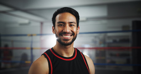 Fitness, boxer and portrait of man in gym for mma fighter, workout and training practice. Wresting challenge, martial arts club and sports with person and boxing ring for exercise and battleの写真素材