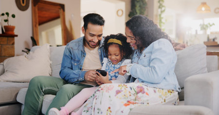Home, girl and family on sofa, smartphone and relax with social media, entertainment and app. Happy,...
