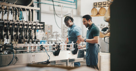 Conveyor belt, people and bottling alcohol in distillery for spirits production, packaging and...