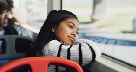 Thinking, child and window on bus in city for travel, public transport and view for sightseeing....