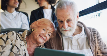 Senior couple, movies or tablet on bus ride to destination for romantic videos, holiday or vacation....