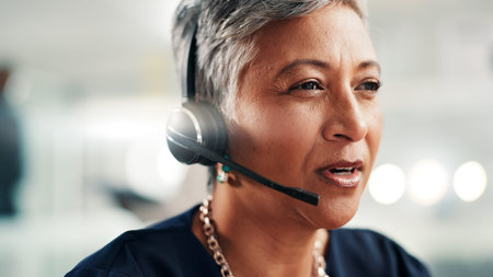 Talking, call center and mature woman in office for contact us, crm service and customer support....