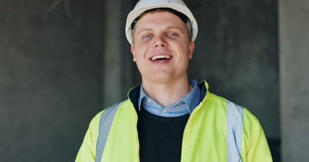 Man, portrait and contractor with laugh for construction, industrial career and building renovation of development. Happy, architect and site inspection with maintenance for infrastructure projectの写真素材