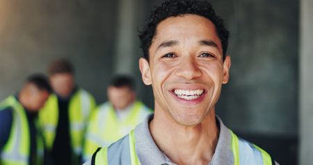 Man, portrait and engineer with smile for construction, industrial career and building renovation of development. Happy, architect and site inspection with maintenance for infrastructure projectの写真素材