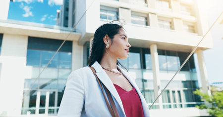 Business woman, city and realtor with vision for corporate building, investment or ambition. Female...