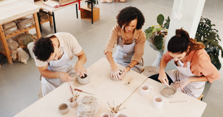 Pottery class, above and people in workshop, conversation and learning with clay manufacturing....