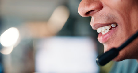 Business, mic and man with closeup, call centre and conversation with help desk. Person, employee and agent in workplace, consulting and headset with mouth, professional and telemarketing with adviceの写真素材