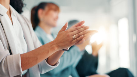 Business people, meeting and seminar with applause for thank you, presentation or speech at office. Closeup, group or employees clapping with team in row for well done, congratulations or good jobの写真素材