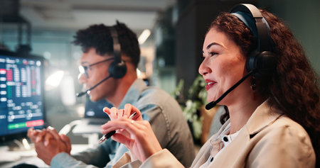 Trading support, talking or woman on computer for customer service, investment advice and market insight. Contact us, call center and happy broker with query for financial news, assistance and dataの写真素材