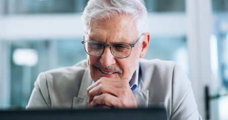 Laptop, smile and solution with business man in office for corporate administration or problem solving. Ideas, planning and thinking with mature professional working on computer for managementの写真素材