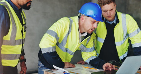 Man, laptop and group at construction site with meeting, review and planning for renovation project....