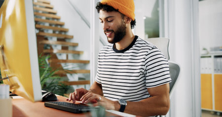 Creative, designer or man on computer typing for artistic project, digital media or video editing....
